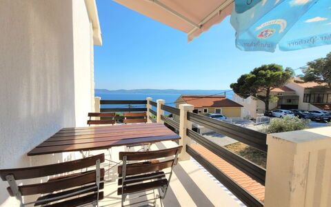 Nina: Sky, Property, Water, Azure, Shade, Plant, Wood, Outdoor Furniture, Building, Real Estate