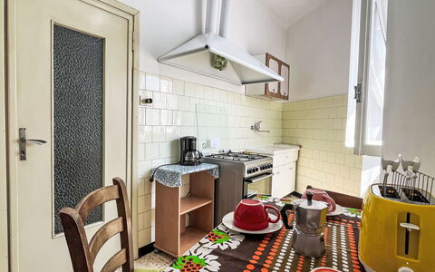 Dolcedo 640: Flooring, Floor, Interior Design, Room, Apartment, Major Appliance, Ceiling, Wood Stain, Kitchen, Kitchen Appliance