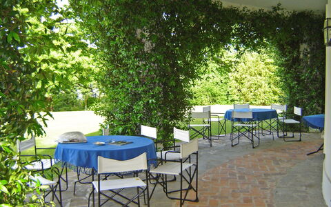 Villa Adriana: Property, Patio, Outdoor Table, Table, Tree, Furniture, Real Estate, Room, Building, Leisure