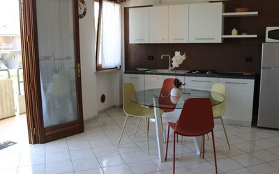 Corte Chiara 741.3: Furniture, Table, Cabinetry, Countertop, Building, Wood, Chair, Floor, Flooring, Kitchen
