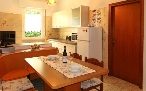Casa Irene: Table, Cabinetry, Property, Countertop, Wood, Chair, Door, Lighting, Interior Design, Kitchen & Dining Room Table