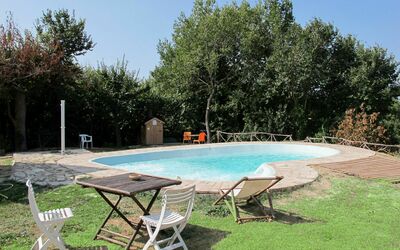 Gabicce Mare 603: Property, Table, Swimming Pool, House, Backyard, Furniture, Real Estate, Outdoor Furniture, Tree, Leisure