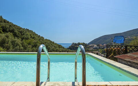 Moneglia 665: Water, Sky, Water Resources, Swimming Pool, Plant, Azure, Rectangle, Natural Landscape, Tree, Wood