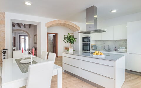Cordella: Countertop, Cabinetry, Furniture, Building, Couch, Houseplant, Wood, Table, Kitchen, Living Room
