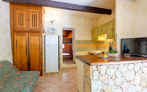 Les Campaou: Cabinetry, Property, Furniture, Countertop, Building, Drawer, Wood, Kitchen, Home Appliance, Interior Design