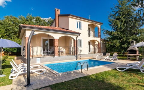 Lara: Sky, Building, Plant, Window, Swimming Pool, House, Tree, Chair, Cloud, Door