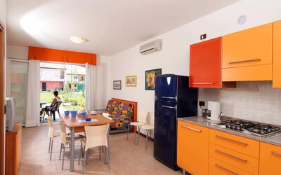 Ai Salici (Cao406) 640.3: Room, Property, Kitchen, Orange, Countertop, Cabinetry, Furniture, Building, Interior Design, Yellow