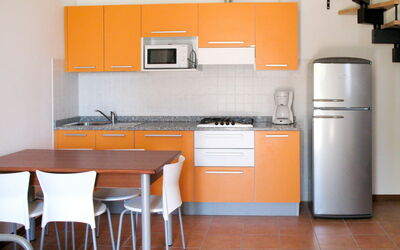 Le Farnie 642.4: Room, Orange, Kitchen, Furniture, Property, Cabinetry, Major Appliance, Kitchen Stove, Countertop, Floor