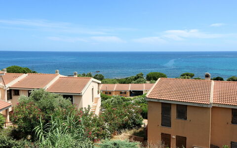 Porto Corallo 612: Sky, Water, Cloud, Daytime, Plant, Window, Building, Azure, House, Land Lot