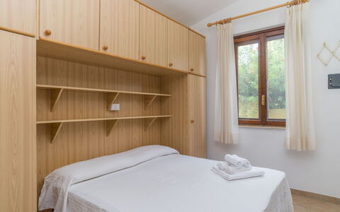Valle degli Oleandri (Rei185): Property, Furniture, Window, Comfort, Cabinetry, Textile, Wood, Architecture, Interior Design