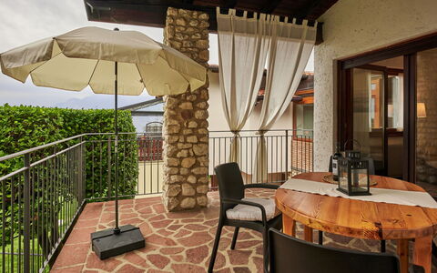 Rocchetta: Table, Furniture, Plant, Chair, Building, Wood, Umbrella, Shade, Architecture, Outdoor Furniture