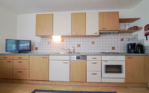 Zell am Ziller 685: Kitchen, Wood, Flooring, Countertop, Kitchen Appliance, Interior Design, Major Appliance, Furniture, Cabinetry, Floor