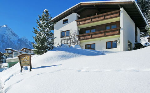 Finkenberg 608: Sky, Building, Snow, Window, Mountain, Tree, House, Slope, Terrain, Larch