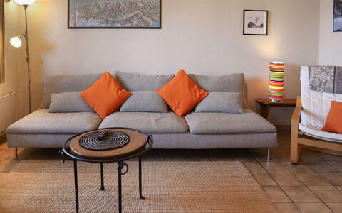 Edelweiss: Furniture, Flooring, Couch, Floor, Interior Design, Living Room, Chair, Cushion, Comfort