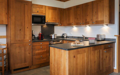 Terrasses du Paradis 5B: Countertop, Cabinetry, Furniture, Kitchen, Kitchen Appliance, Home Appliance, Wood, Drawer, Building, Architecture