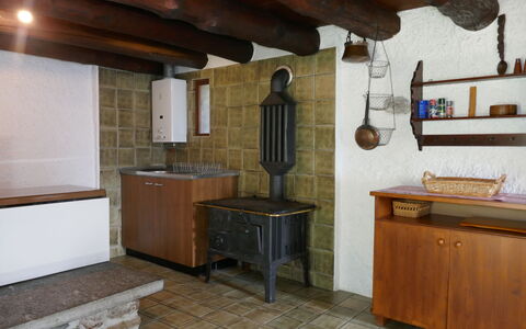 Rustico Girasole: Cabinetry, Property, Building, Countertop, Wood, Kitchen, Window, House, Interior Design, Flooring