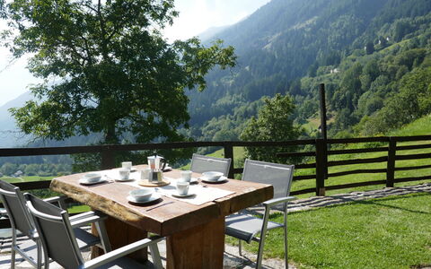 Rustico Girasole: Table, Furniture, Sky, Cloud, Plant, Tree, Mountain, Outdoor Furniture, Wood, Outdoor Table
