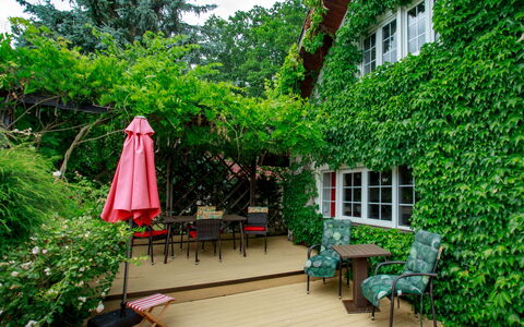 Karasova Ii: Plant, Window, Green, Building, Sky, Table, Chair, Tree, Outdoor Furniture, Grass