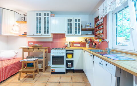 Karasova Ii: Kitchen, Kitchen Appliance, Major Appliance, Furniture, Interior Design, Countertop, Wood, Cabinetry, Flooring, Room
