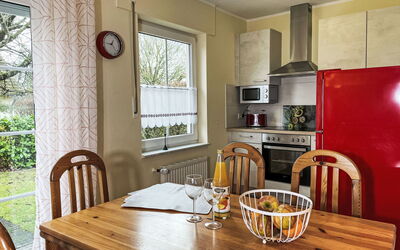 Plau am See 621: Table, Furniture, Property, Chair, Cabinetry, Window, Wood, Countertop, Interior Design, Lighting
