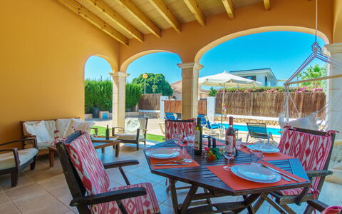 Frijoles: Table, Furniture, Property, Chair, Azure, Shade, Outdoor Furniture, Building, Lighting, Interior Design