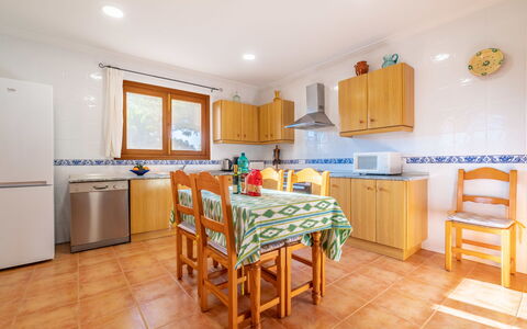 Morla: Furniture, Cabinetry, Property, Kitchen, Table, Wood, Kitchen Appliance, House, Drawer, Living Room