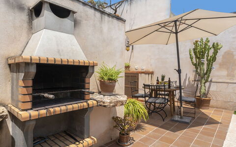 Pueblo: Plant, Property, Flowerpot, Sky, Houseplant, Building, Outdoor Furniture, Shade, Real Estate, Gas