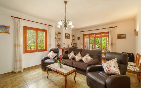 Can Damia: Brown, Furniture, Table, Property, Picture Frame, Couch, Plant, Wood, Interior Design, Window