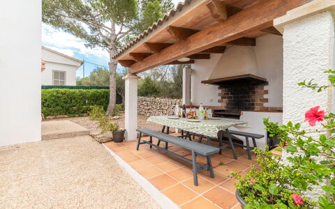 Ca Na Rosa: Plant, Furniture, Building, Table, Sky, Flower, Wood, Outdoor Furniture, Shade, Outdoor Bench