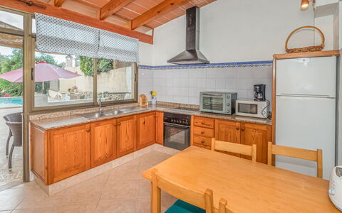 Sa Rossa: Cabinetry, Countertop, Furniture, Property, Kitchen, Kitchen Appliance, Wood, Kitchen Sink, Kitchen Stove, Interior Design