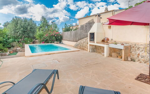 Sa Rossa: Cloud, Sky, Property, Plant, Blue, Azure, Water, Building, Shade, Outdoor Furniture