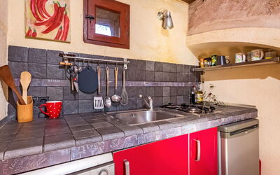 Casa Groc (Cix130) 604.1: Countertop, Property, Room, Kitchen, Tile, Cabinetry, Furniture, Interior Design, Building, House
