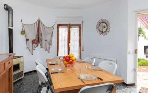 L'Escapade: Furniture, Table, Plant, Chair, Building, Wood, Orange, Window, Interior Design, Houseplant