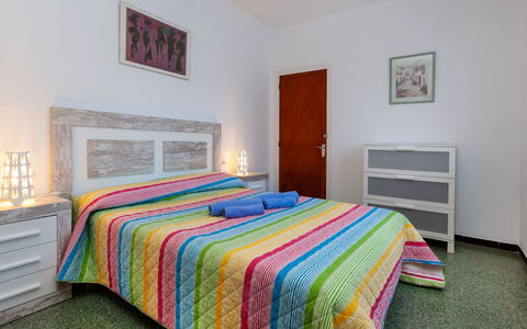 L'Escapade: Bedroom, Bed, Bed Sheet, Room, Furniture, Property, Bed Frame, Bedding, Real Estate, Yellow