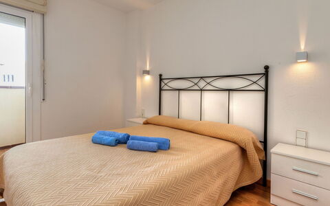 L'Escala 731: Bedroom, Bed, Furniture, Room, Property, Bed Sheet, Bed Frame, Interior Design, Wall, Floor