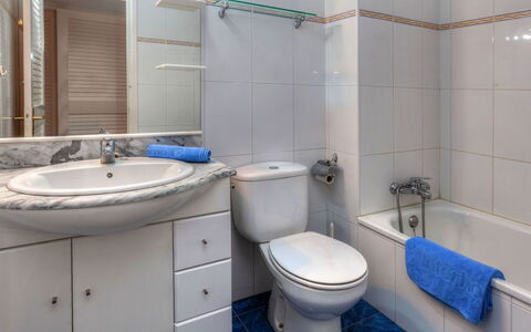 L'Escala 731: Bathroom, Property, Room, Blue, Tap, Bathroom Accessory, Plumbing Fixture, Toilet, Wall, Interior Design