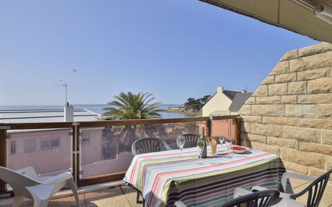 Belle Vue Mer et Groix: Sky, Property, Furniture, Table, Shade, Chair, Outdoor Furniture, Outdoor Table, Interior Design, Building