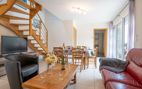 Gîte des Perdrix: Furniture, Table, Property, Wood, Interior Design, Lighting, Orange, Chair, Flooring, Floor