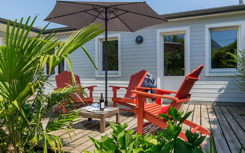 Gîte au Jardin: Plant, Furniture, Property, Building, Window, Chair, Shade, Outdoor Furniture, Sky, Land Lot