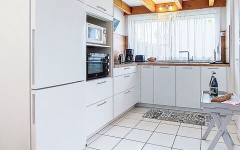 Tal Ar Mor: Kitchen, Kitchen Appliance, Countertop, Cabinetry, Flooring, Major Appliance, Interior Design, Wood, Floor, Furniture