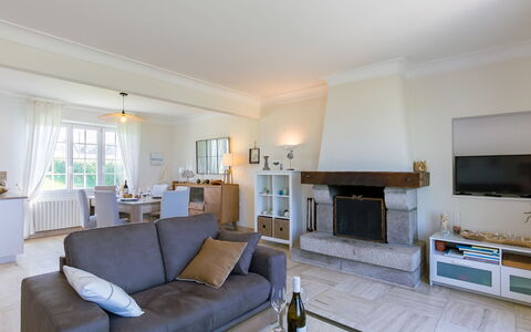 Cam Louis: Couch, Furniture, Table, Building, Azure, House, Picture Frame, Houseplant, Lighting, Interior Design