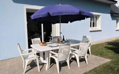 Ty Coat Pin: Table, Furniture, Building, Window, Plant, Chair, Umbrella, Outdoor Table, Outdoor Furniture, Shade