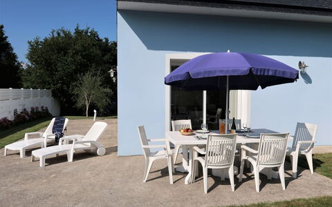 Ty Coat Pin: Table, Furniture, Property, Building, Chair, Plant, Shade, Window, Outdoor Furniture, Sky