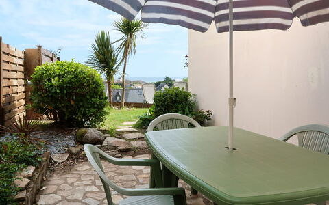 Tal Ar Mor: Property, Umbrella, Outdoor Table, Table, Patio, Real Estate, Furniture, Shade, House, Building