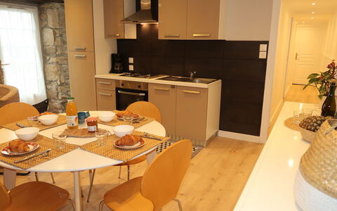 Plozévet 605: Furniture, Cabinetry, Property, Countertop, Table, Chair, Kitchen, Window, Wood, Lighting