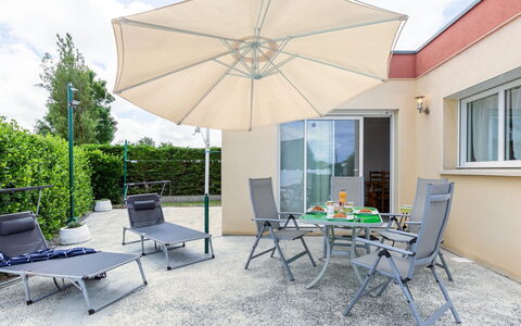 Ty Fañch: Table, Furniture, Building, Plant, Chair, Window, Shade, Azure, Cloud, Outdoor Furniture
