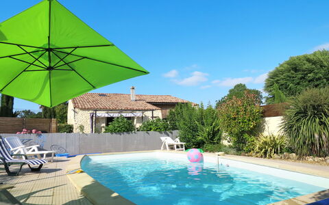 Tuilières: Water, Plant, Property, Building, Swimming Pool, Green, Sky, Azure, Shade, Umbrella