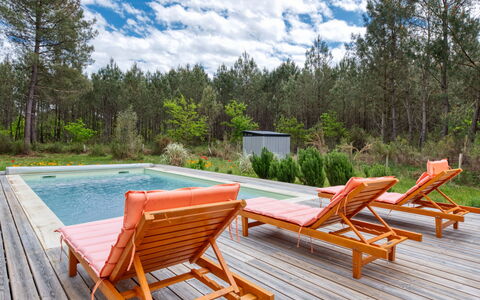 Nico: Cloud, Sky, Plant, Property, Furniture, Water, Nature, Tree, Outdoor Furniture, Chair