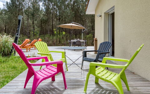 Nico: Plant, Property, Furniture, Tree, Outdoor Furniture, Wood, Shade, Chair, Outdoor Table, Building
