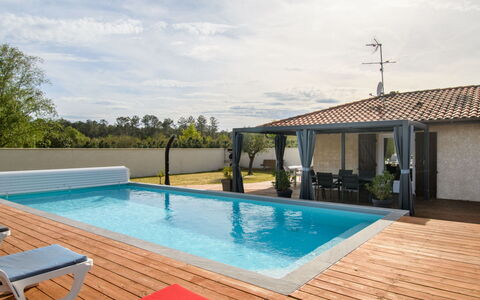 Petrocq: Water, Sky, Cloud, Swimming Pool, Plant, Azure, Shade, Chair, Outdoor Furniture, Tree